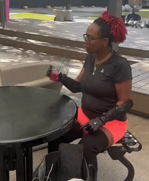 Hero Arm user using their bionic arm outdoors
