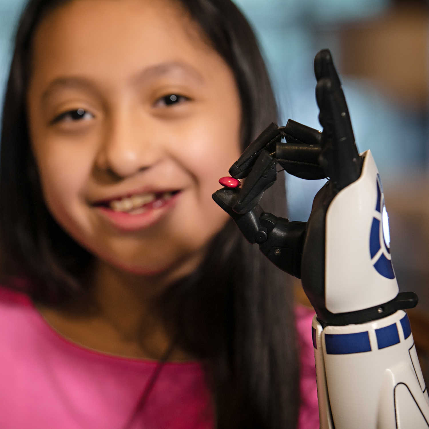 Child confidently wearing a Hero Arm